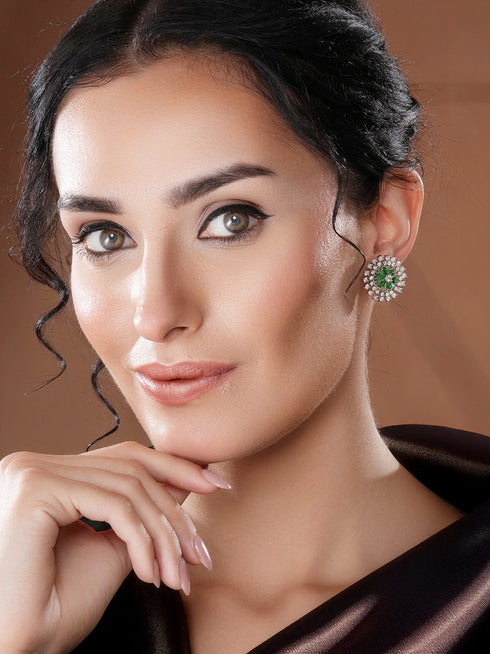 White Rhodium Green Emerald Studded Floral Design Solar Statement Studds Earrings
