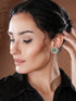 White Rhodium Green Emerald Studded Floral Design Solar Statement Studds Earrings
