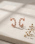 18kt Rose Gold Plated CZ Half Hoop Earring