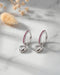 Rhodium Plated Ruby Red Studded Dangling Puffed Heart Mini Hoop Earring