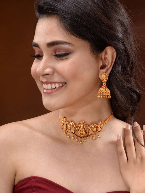 Gold Plated Multi stone studded Handcrafted Exquisite Temple Lakshmi ji & Peacock Design Jewellery Set