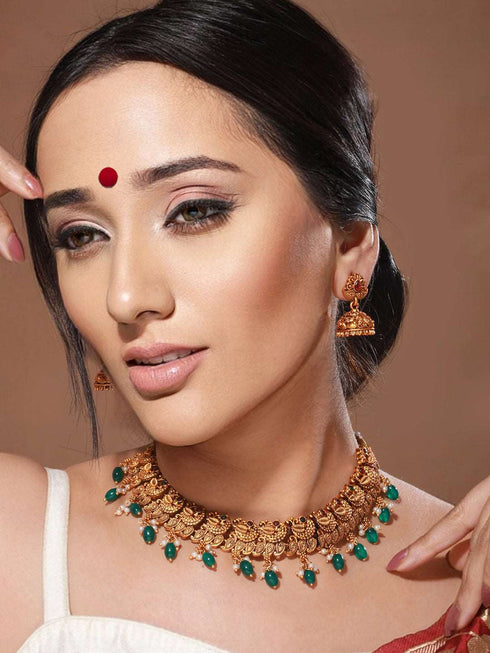 Gold Plated Green Stone Studded Peacock temple Jewellery Set