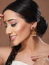 Gold Toned Red & Green Stone Studded Flower Jhumka Earrings