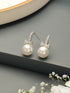 White Rhodium Plated AD & Pearl Studded Bow Pearl Drop Minimal earrings