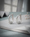 Rhodium Plated Oval Mini Hoop Earring