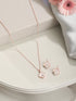 Anti-Tarnish Rose Gold Plated Faux Pearl & AD Embellished Floral Pendant ChainJewellery Set