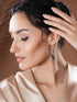 Gold Toned Blue Cyrstal tear drop dangler shaped minimal Earrings