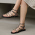 Women's Patent Studded Gladiator Flat Sandals