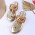 Women's Metallic Gold Flat Toe-Ring Sandal with Multicolored Woven Strap