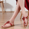 Women's Flat Thong Sandal with Studded Bow/Flower Accent