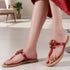 Women's Flat Thong Sandal with Studded Bow/Flower Accent