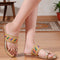 Women's Metallic Gold Flat Toe-Ring Sandal with Multicolored Woven Strap