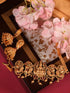 Gold Plated Multi stone studded Handcrafted Exquisite Temple Lakshmi ji & Peacock Design Jewellery Set