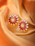 Gold Plated ornate Floral studs Red & White AD encrusted Earrings
