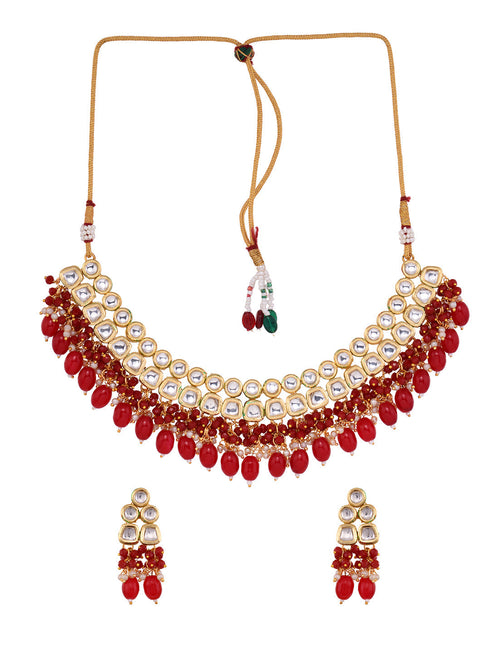 Gold Toned Kundan & Red Bead studded Handcrafted Jewellery Set