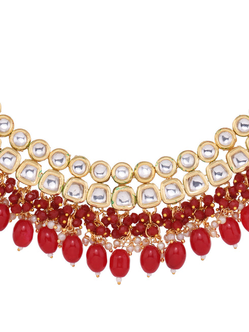 Gold Toned Kundan & Red Bead studded Handcrafted Jewellery Set