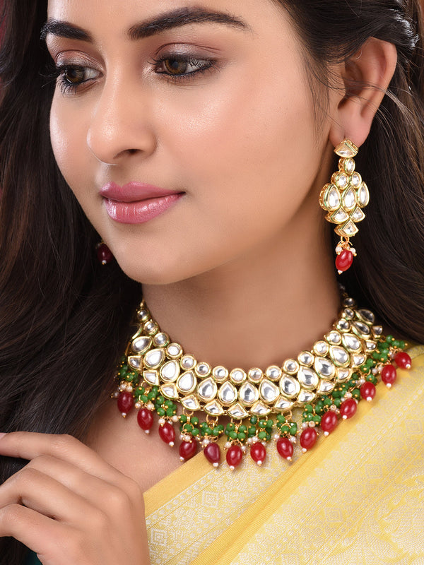 Gold Toned Kundan studded Red & Green Bead studded Handcrafted Jewellery Set