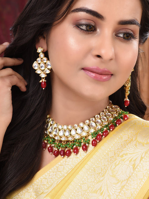 Gold Toned Kundan studded Red & Green Bead studded Handcrafted Jewellery Set