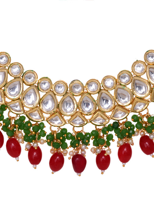 Gold Toned Kundan studded Red & Green Bead studded Handcrafted Jewellery Set