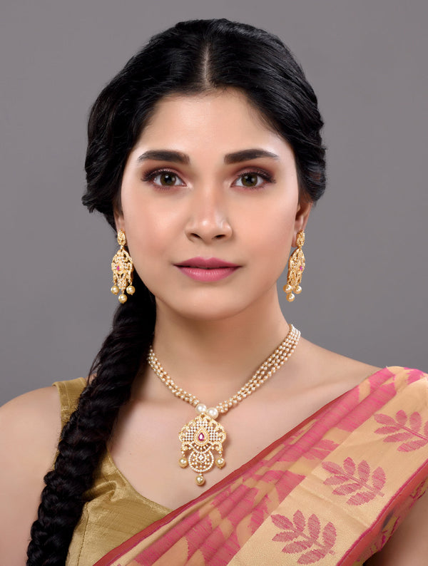 Gold Plated Red AD and Pearl Studded Traditional PendantNecklace White Pearl Mala and Earrings
