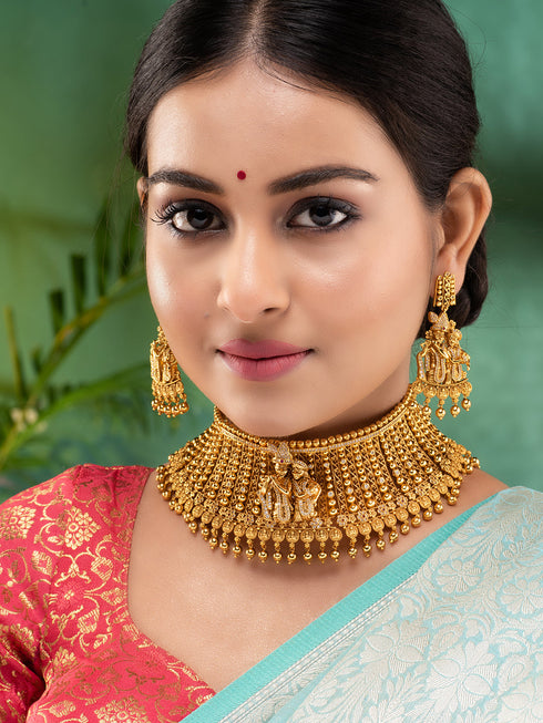 GoldPlated White AD Embellished Temple Radhe Krishna Choker Jewellery Set