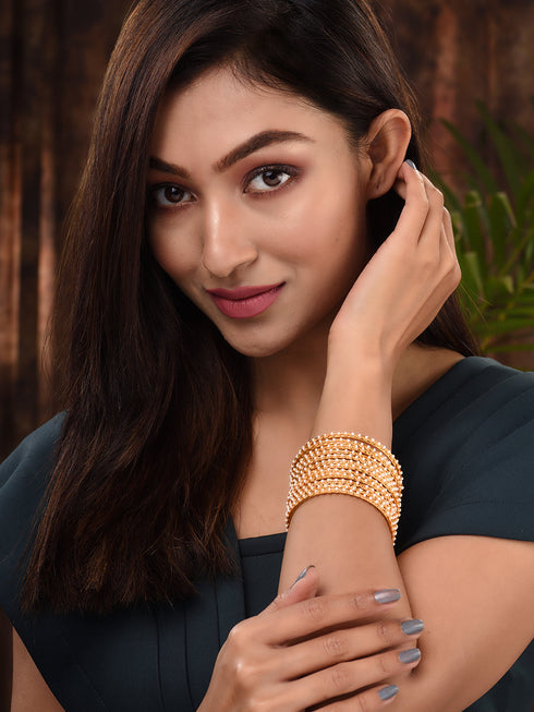Set Of 12 Gold Plated & Pearl Studded Bangles