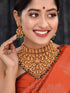 Gold Plated Intricate Temple Design Dangling Green Beads Choker Jewellery Set