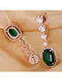 Bottle green drop earrings diamond studded