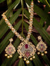 Gold Plated Red AD & Pearl studded Pendant Necklace and Earrings Set