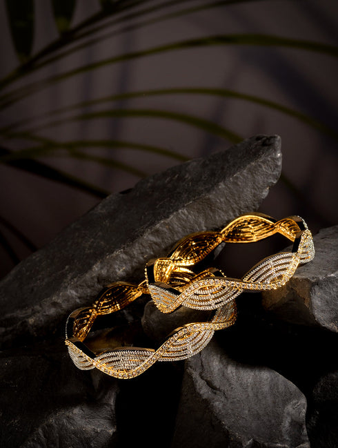 A Pair Of 2 Gold Dual Toned AD Studded hand Crafted Bangles