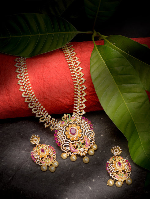 Gold Plated Multi AD & Pearl Studded Hand Crafted Peacock Motif Pendant Necklace Earrings Set
