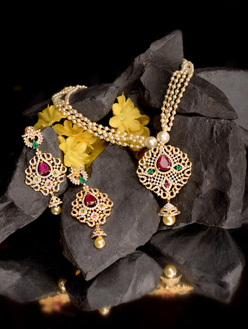 Gold Plated AD and Pearl Studded Traditional Pendant White Pearl Mala and Earrings