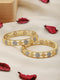 A Pair of 2 Gold Toned Intricate design Bangle Bracelet