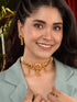 Women GoldPlated Red KempStudded Temple Jewellery Set
