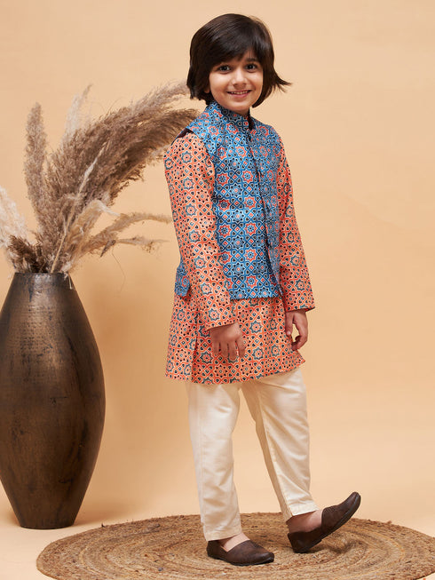 Boy's Orange Printed Kurta And Cream Pyjama Set With Blue Nehru Jacket