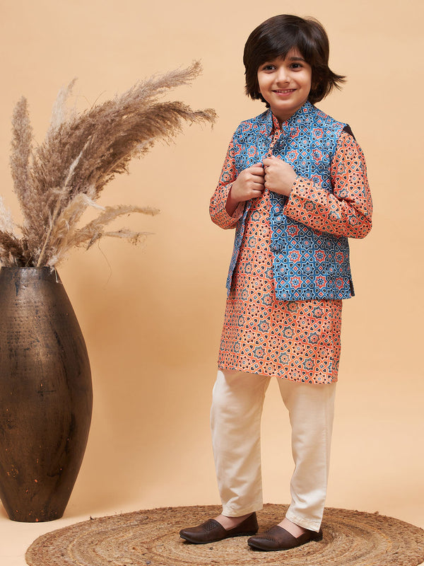 Boy's Orange Printed Kurta And Cream Pyjama Set With Blue Nehru Jacket