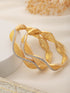 A Pair Of 2 Gold Dual Toned AD Studded hand Crafted Bangles