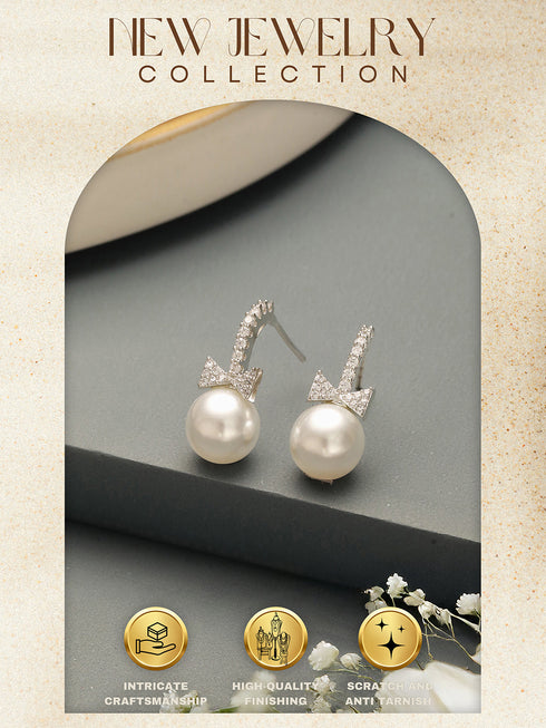 White Rhodium Plated AD & Pearl Studded Bow Pearl Drop Minimal earrings